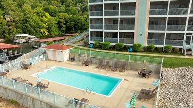 Wake up to peaceful cove views from your screened deck at this - photo 24