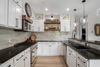 Tucked into the highly sought after Condos at Mill River - photo 10