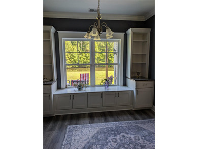 Beautiful open floorplan house with view of pond in backyard - photo 21