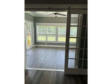 Beautiful open floorplan house with view of pond in backyard - photo 24