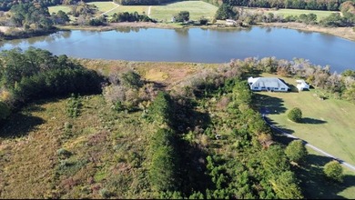This 6.3 Acerage parcel has an amazing waterfront view. Located - photo 3