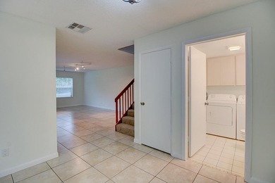 Tranquil 2-story townhouse featuring a bright, open floor plan - photo 10