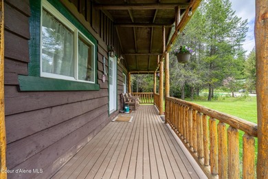 Tucked away near beautiful Priest Lake, this darling and - photo 6