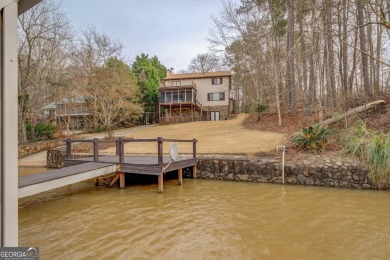 Welcome to this beautifully renovated lakefront home in Turtle - Lake Home For Sale in Monticello, Georgia