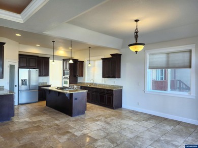 Enjoy stunning views from this elegant custom built home