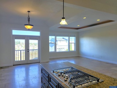 Enjoy stunning views from this elegant custom built home