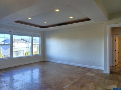 Enjoy stunning views from this elegant custom built home