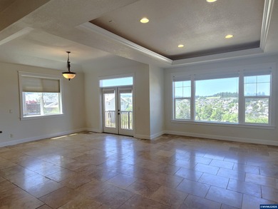 Enjoy stunning views from this elegant custom built home