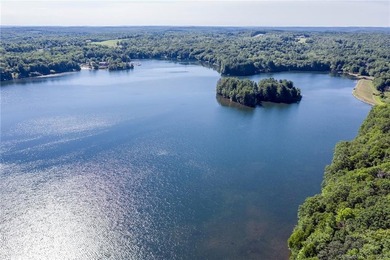 Set along the serene shores of Woodridge Lake, Lot 5 on Milton - photo 8