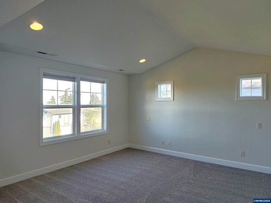 Enjoy stunning views from this elegant custom built home