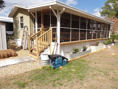 This 1986 1 BR 1 BA Mobile home offers 396 SQ FT plus a - photo 3