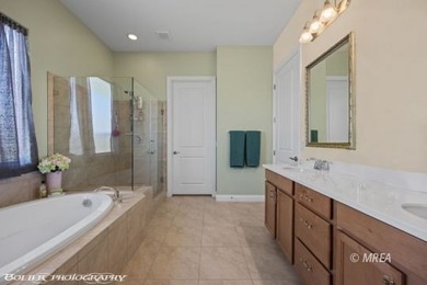 Welcome to this beautifully appointed three-bedroom Serenity