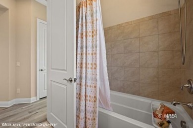 Welcome to this beautifully appointed three-bedroom Serenity