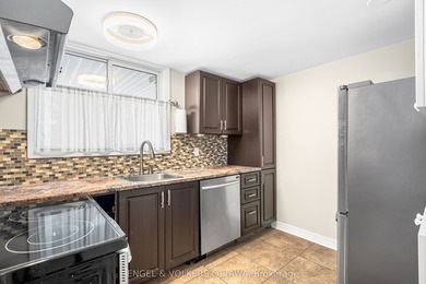 Welcome to this beautifully renovated 2-bedroom main floor condo - photo 12