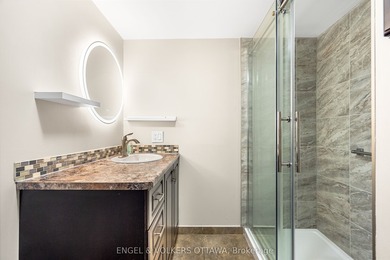 Welcome to this beautifully renovated 2-bedroom main floor condo - photo 19