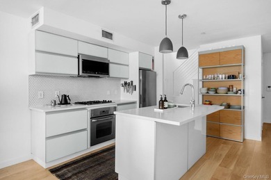 Welcome home to Residence #PHA - a sun-filled duplex penthouse - photo 3