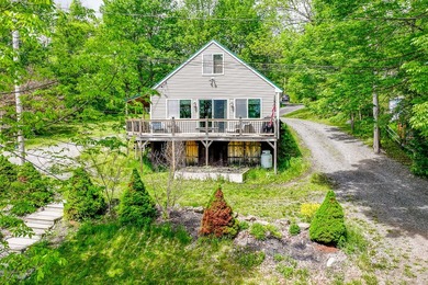This adorable and serene waterfront retreat on Pattee Pond is - photo 2