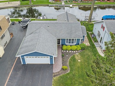 Exceptional, move-in ready waterfront ranch nestled on a - photo 2