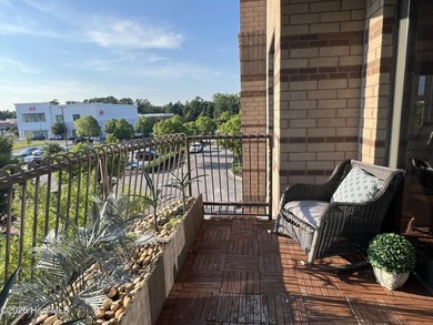 This extensively upgraded, rare corner residence at Unit 212 in - photo 3