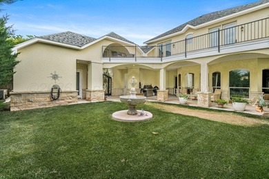 Nestled on the 13th hole, this exceptional golf course estate - photo 6