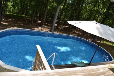 Escape to your own private retreat on 5 beautiful wooded acres - photo 37