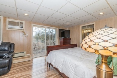 Situated at 12 Cedar Dr in Webster, MA, United States, this - photo 34