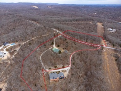 Nature abounds in this private oasis of over 7 acres! This is