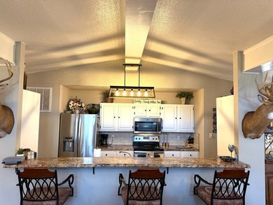 CHECK OUT THE DECK ON THIS HOME AND JUST 5 MINUTES FROM FFB - photo 11