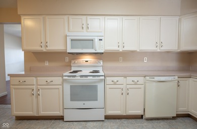 Charming, updated, and move-in ready, this ranch-style condo at