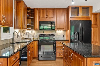Tucked along the shores of Lake Monticello, is this Custom - photo 14