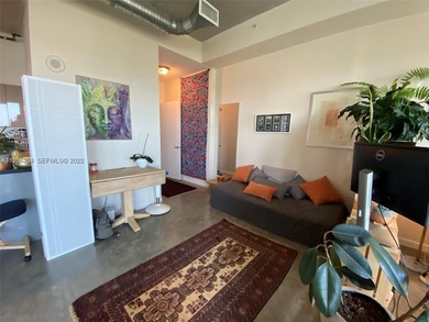 Live the ultimate Miami loft lifestyle in this expansive 2BR/2BA