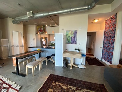 Live the ultimate Miami loft lifestyle in this expansive 2BR/2BA