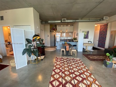 Live the ultimate Miami loft lifestyle in this expansive 2BR/2BA