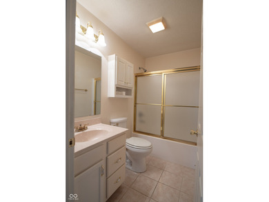 Charming, updated, and move-in ready, this ranch-style condo at