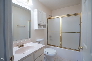 Charming, updated, and move-in ready, this ranch-style condo at