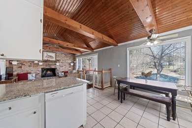 Tucked along the water's edge, this charming rustic cottage is - photo 16