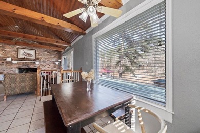 Tucked along the water's edge, this charming rustic cottage is - photo 18