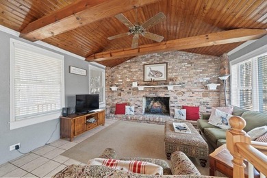Tucked along the water's edge, this charming rustic cottage is - photo 20