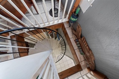 Tucked along the water's edge, this charming rustic cottage is - photo 21