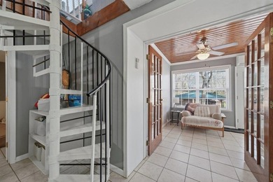 Tucked along the water's edge, this charming rustic cottage is - photo 24