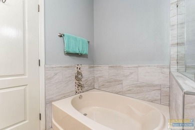 Welcome to this charming 3-bedroom, 2-bath Golf Villa located in - photo 32