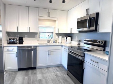 This stunning corner-lot home has been fully renovated and is - photo 6