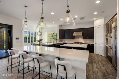 Set on an elevated, private flag lot in the coveted N Scottsdale