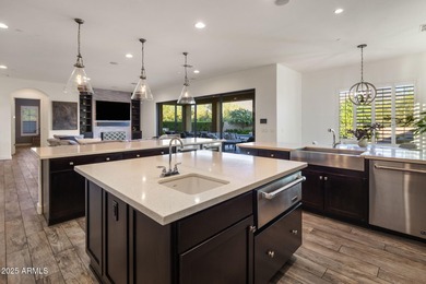 Set on an elevated, private flag lot in the coveted N Scottsdale