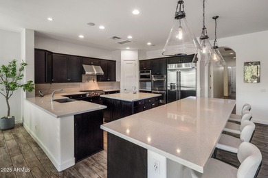 Set on an elevated, private flag lot in the coveted N Scottsdale