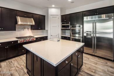 Set on an elevated, private flag lot in the coveted N Scottsdale