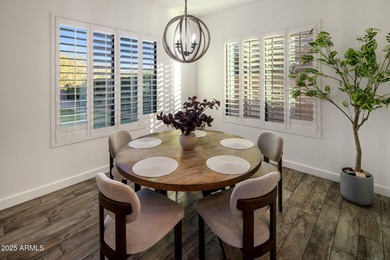 Set on an elevated, private flag lot in the coveted N Scottsdale