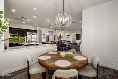 Set on an elevated, private flag lot in the coveted N Scottsdale