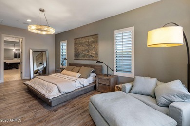 Set on an elevated, private flag lot in the coveted N Scottsdale