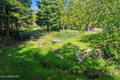 Tucked into the hillside just 26 minutes from Sandpoint, this - photo 4